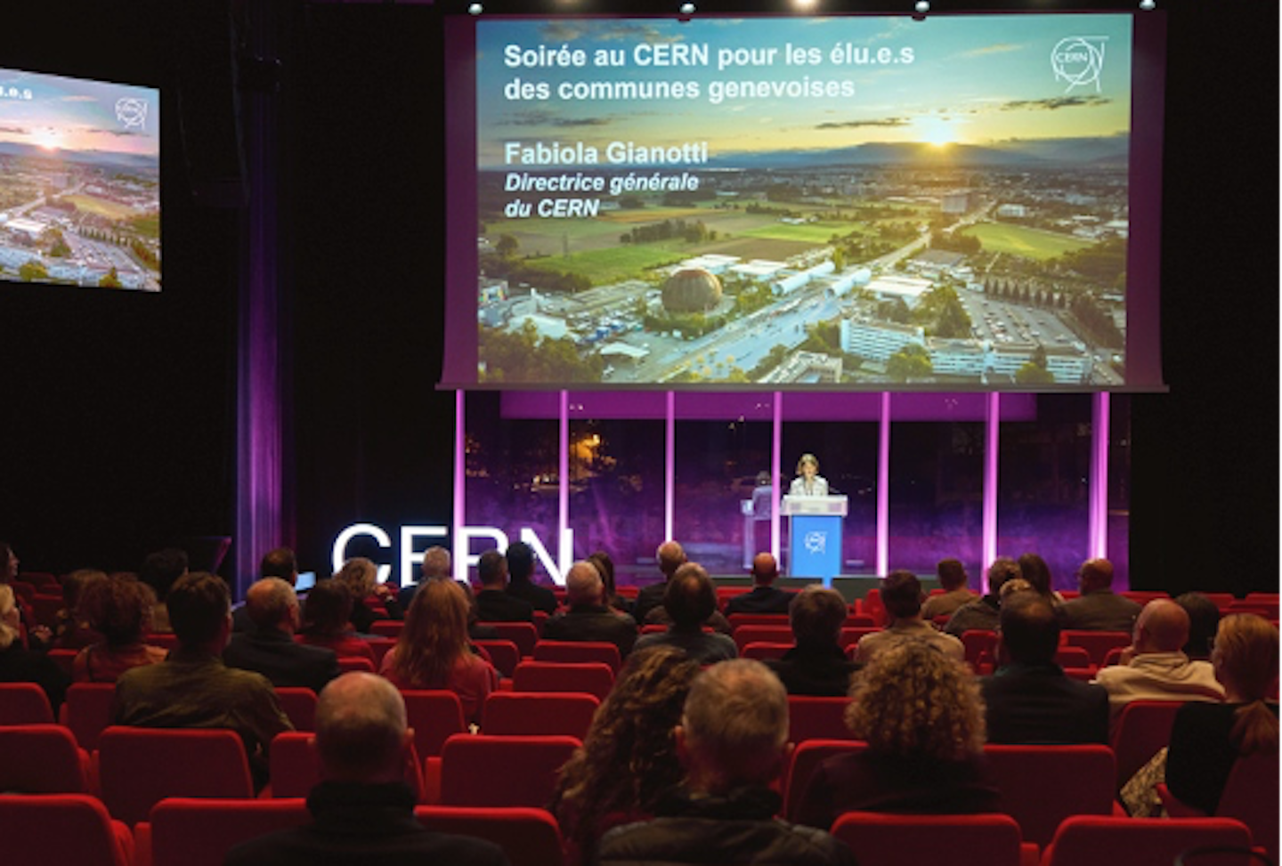 An audience attending a presentation
